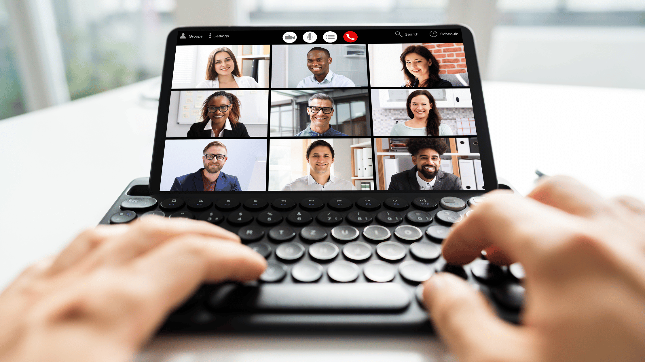 Types of Video Conferencing What is video conferencing? A video conference is a meeting or series of meetings held using computer-based video equipment. Multipoint or point-to-point video chat is available. A significant benefit of a video conferencing system is that it only requires one network connection, which means that all sites participating can share information without delay because they do not need to rely on additional network links between them. Moreover, video conferencing is a tool that enables real-time communication over the internet. Teleconferencing and online conferencing are other terms for it. It can be used for online meetings, lectures, interviews, and other interactions between people in various parts of the world. Cameras and microphones are used in video conferencing systems to send real-time audio and video over the internet, but other communication technologies such as VoIP (Voice over IP) or instant messaging may also be used. Here are the types of video conferencing: • Desktop Video Conferencing: This form of video conferencing enables users to conduct virtual meetings from their desktop or laptop computer. Typically, it entails software or a web-based platform that facilitates real-time audio and video communication, screen sharing, and collaborative tools. Desktop Video Conferencing is the initial stage towards a more streamlined conferencing experience. It enables users to initiate a video contact with a single click, allowing them to communicate face-to-face without having to set up a room or a meeting. Your team members can also use desktop video conferencing to share their screens, collaborate on documents and presentations, or simply catch up on life events. • Room-Based Video Conferencing: A more sophisticated form of video conferencing that is intended for use in conference rooms or other large meeting spaces is room-based. It usually includes specialized hardware such as cameras, microphones, and displays, as well as specialized software for conference management. The majority of online conferences are held in a dedicated conference room. It requires a gathering space outfitted with a camera and a screen so that attendees can see one another. Different technologies are used for these conferences, but Ethernet cables or wireless networks are typically used to link the cams together. Advantages of room-based conferencing include easy set-up and use, the ability to share documents via screen sharing or by printing them out on paper and placing them in front of participants’ faces when they speak, and the ability to record meetings for later review or as training material. • Mobile video conferencing: Mobile video conferencing enables individuals to participate in virtual meetings using their mobile devices, such as smartphones and laptops. Mobile video conferencing is also known as mobile teleconferencing. It frequently requires the utilization of specialized apps that enable real-time voice and video communication, screen sharing, and other collaborative features to be able to function properly. • A webinar is a form of video conferencing in which one or more presenters give a presentation to a large audience. Typically, webinars involve one or more presenters presenting the presentation. While participants can engage with the presenters via chat or other communication tools, the primary emphasis is on the presentation itself rather than on collaborative conversation. • Live streaming is the process of broadcasting a video conference or other form of event in real time over the internet. Live streaming can also be referred to as webcasting. It enables a large audience to participate in the event remotely and generally requires specialized software or hardware for capturing and broadcasting the video and audio. It also makes it possible for the audience to participate in the event. In conclusion. Video conferencing is no longer limited to office meetings and webinars. With tools such as Skype, Google Hangouts, and Facetime, we can now video conference with individuals from around the globe, regardless of our location. However, not all video conferencing platforms have the same capabilities, nor are they priced similarly. The difficulty lies in determining which option best meets your requirements. If a business intends to hold recurring video conferences, such as a weekly online seminar delivered through an online portal, the cost of entry will likely be higher than if it only intends to conduct one-time meetings with attendees from across the globe. Need to deploy a new solution for your video conference or simply revamp your video conference systems? Beyontel is a vendor-agnostic IT consulting company specializing in VoIP and cloud-based unified communications. Reach out to us today for proper guidance!